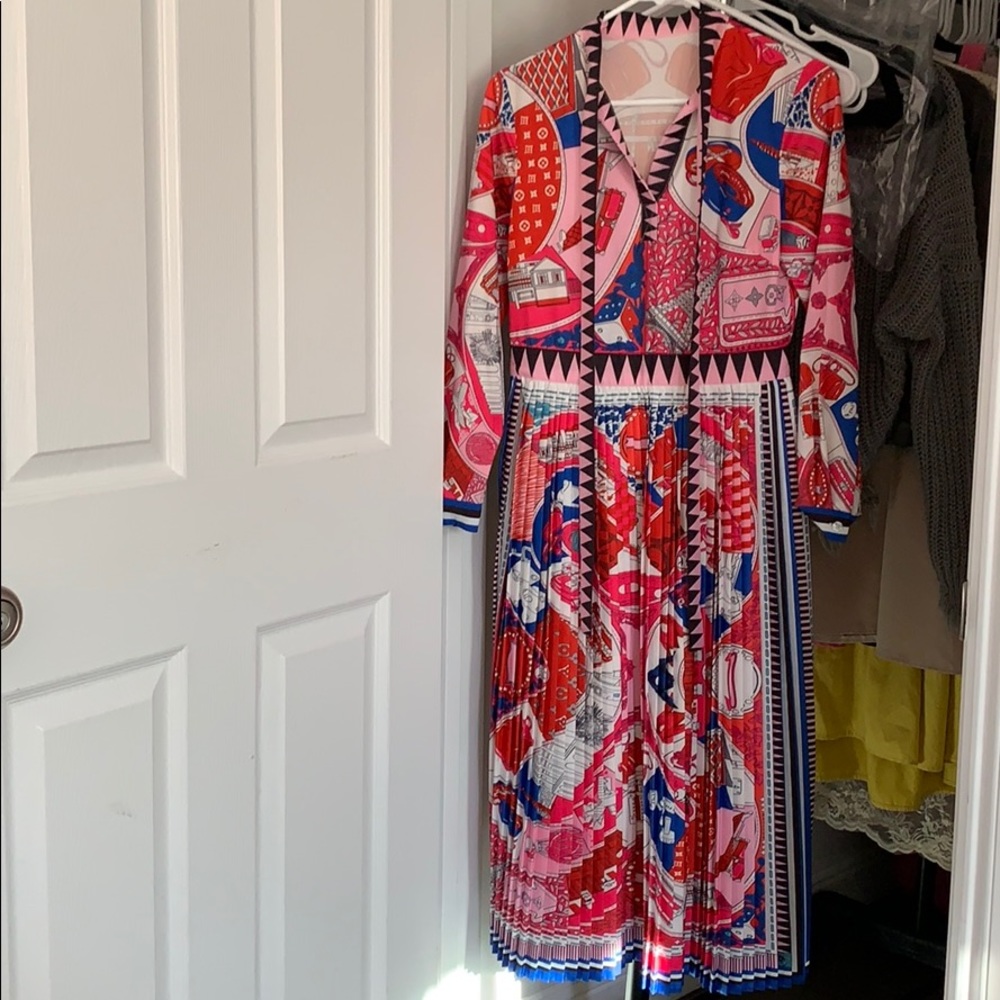 Red long sleeve dress with some patterns